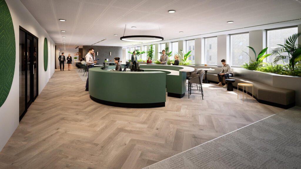 Modern office reception area at De Entree with green circular desk, people interacting, and natural light from large windows.